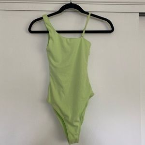 green bodysuit